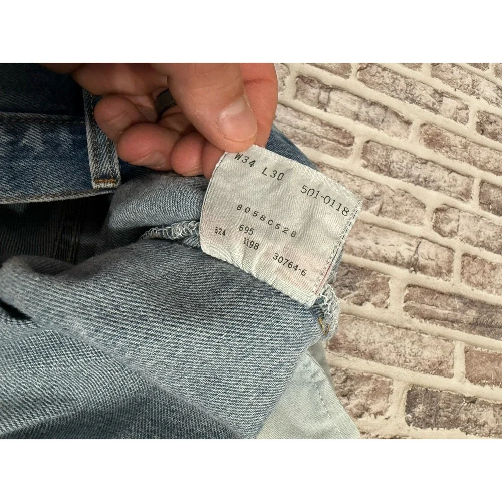 VTG Levis 501 Mens 33x30 Light Wash Jeans  Made USA Ripped Repair Distressed 90s